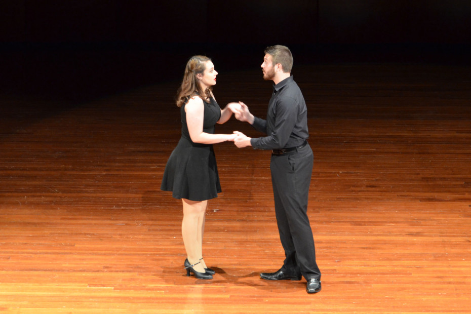 two people on an empty stage